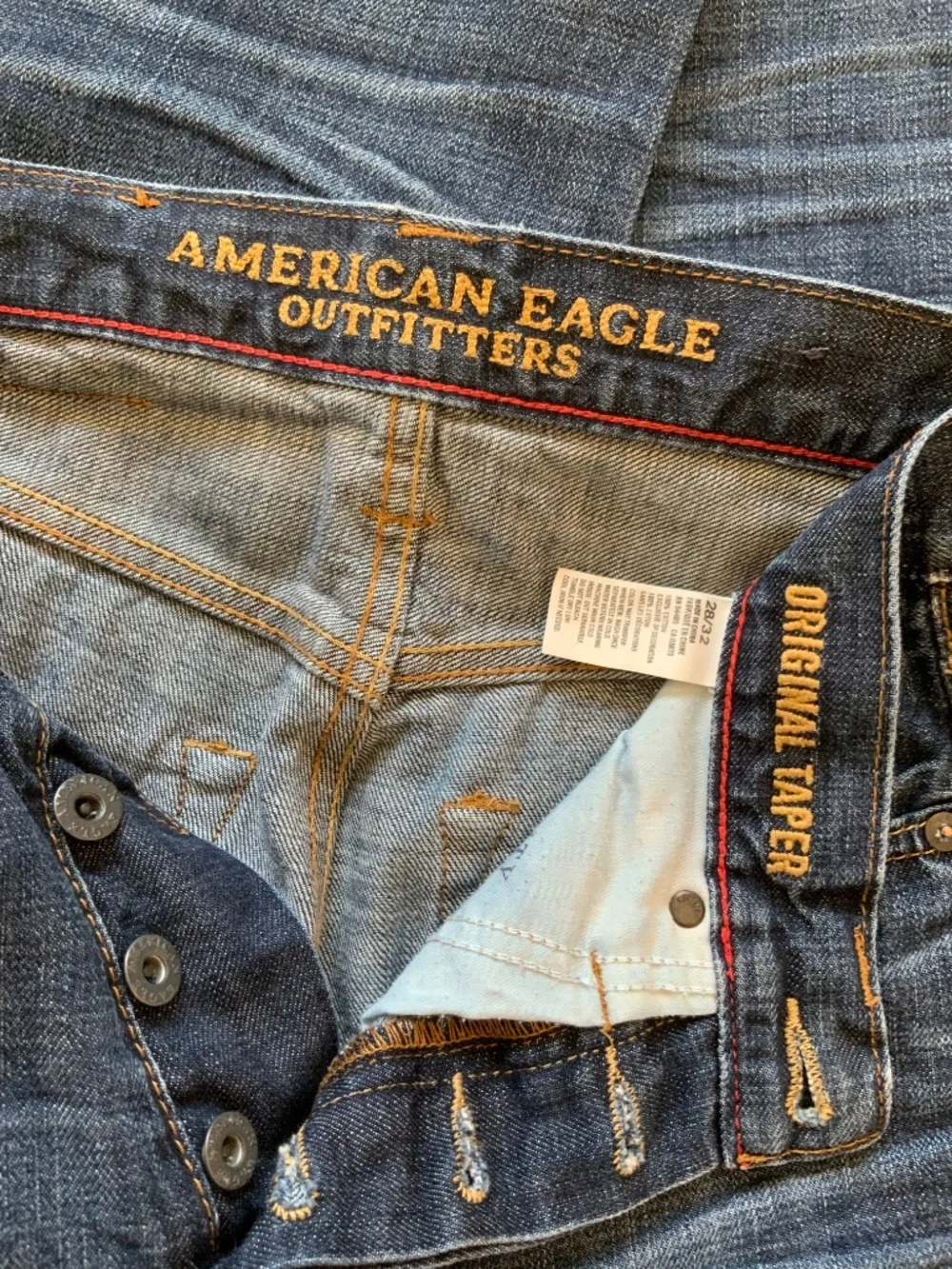 American Eagle Original Taper Distressed Jeans